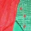 Women green embroidered dress material with hot pink embellished dupatta